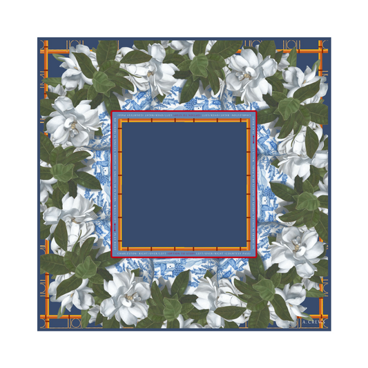 white floral mahjong playing mat with blue center and bamboo accent frame