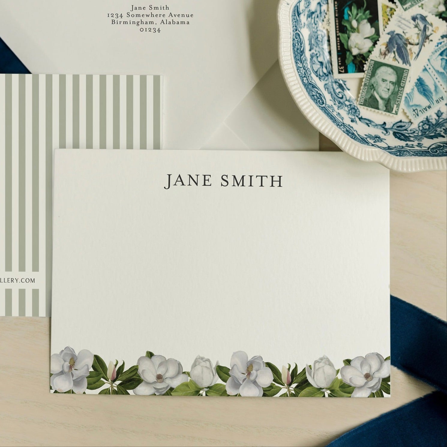 Amy Crews Art - Magnolia Stationery set with a floral border and 'Jane Smith' text on a neutral background