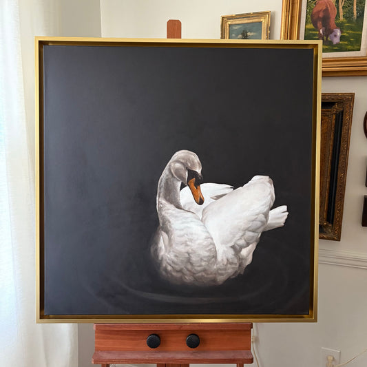 swan oil painting in gold frame black background